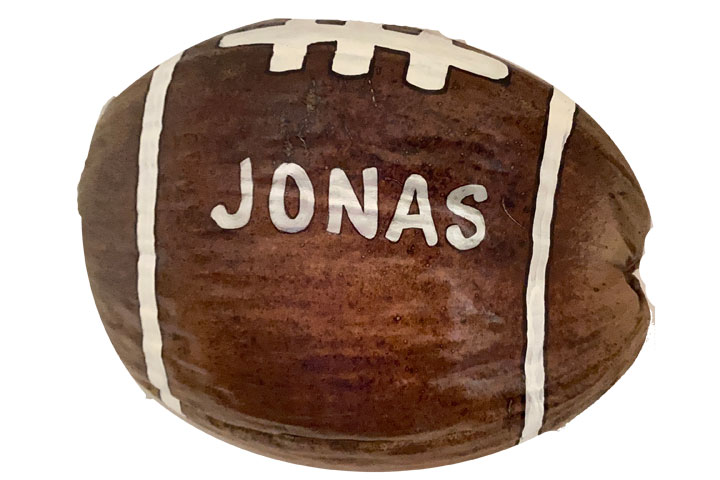 Painted football coconuts