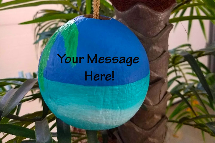 painted coconut ornaments and holiday decor